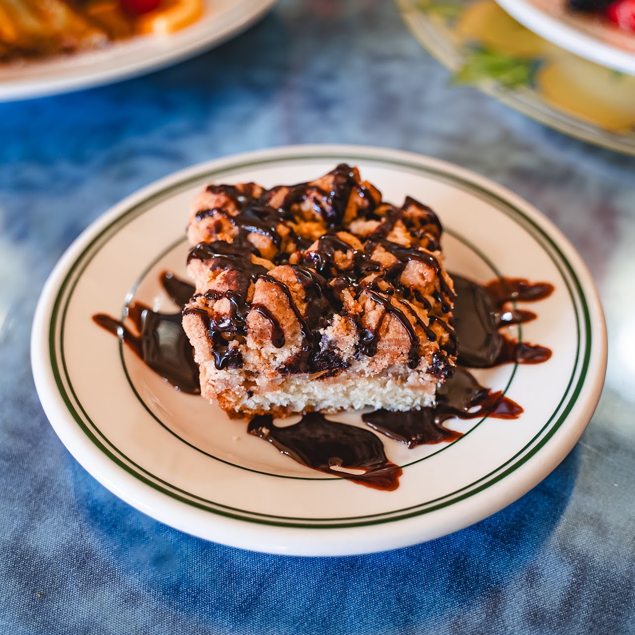 Chocolate crumb cake on a plate.